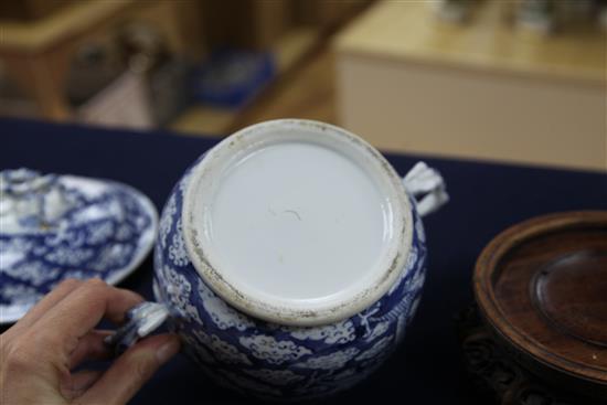 A Chinese blue and white bowl and cover, wood stand